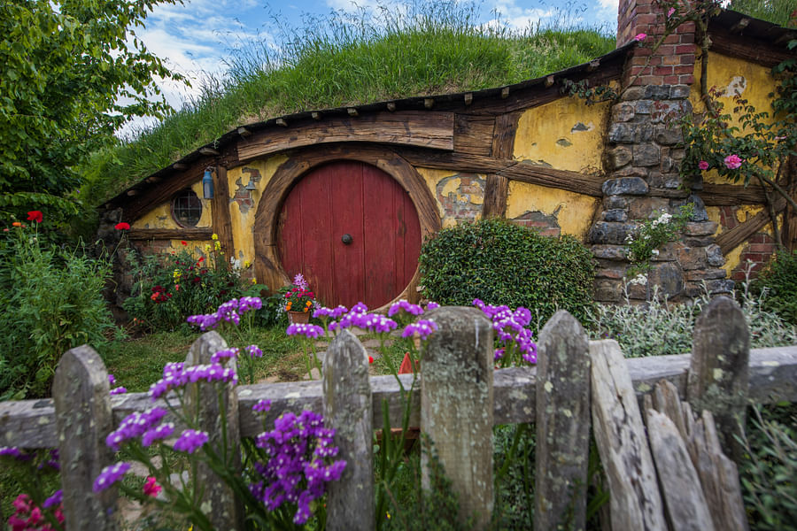 Lush green landscape of Hobbiton set in Matamata, New Zealand
